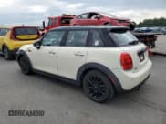 ✅ 2017 MINI Hardtop 4 Door Cooper • VIN: WMWXU1C32H2F77420 • Lot: 62735854. Listed on Copart with 74,500 mi. Free auction sales archive from the USA and detailed vehicle history report at DreamBid. Image 2.