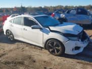 ✅ 2017 Honda Civic Touring • VIN: 19XFC1F90HE011533 • Lot: 43554429. Listed on IAAI with 112,255 mi. Free auction sales archive from the USA and detailed vehicle history report at DreamBid. Image 1.