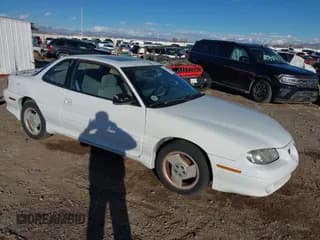 ✅ 1996 Pontiac Grand Am • VIN: 1G2NW12T1TC804543 • Lot: 41590581. Wystawiony na IAAI z przebiegiem 118 158 mil. Bezpłatny archiwum sprzedaży aukcyjnych z USA i szczegółowy raport historii pojazdu na DreamBid. Zdjęcie 1.