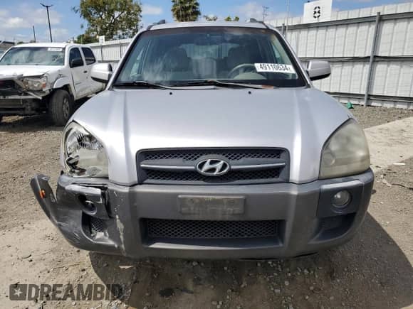 2005 Hyundai Tucson GLS with VIN KM8JN12DX5U079717, listed as a Copart auction lot 49110634 with 178,731 mi miles and Salvage title. Bid and sale history available at DreamBid. Image 5.
