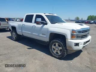 ✅ 2018 Chevrolet Silverado 2500HD High Country • VIN: 1GC1KXEY4JF279148 • Лот: 41957458. Опубликован ранее на IAAI с пробегом 74 247 миль. Бесплатный доступ к архиву аукционных продаж из США и подробный отчёт об истории автомобиля на DreamBid. Изображение 1.