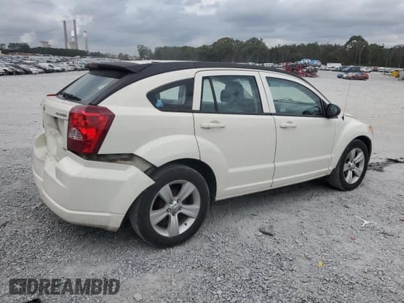 ✅ 2010 Dodge Caliber SXT • VIN: 1B3CB4HA9AD617985 • Лот: 79630514. Опубликован ранее на Copart с пробегом 249 554 миль. Бесплатный доступ к архиву аукционных продаж из США и подробный отчёт об истории автомобиля на DreamBid. Изображение 3.