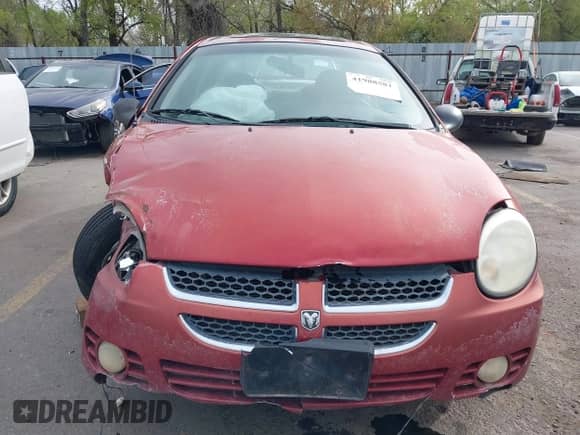 2004 Dodge Neon SXT z VIN 1B3ES56C04D504384, wystawiony jako IAAI lot #41988581 z przebiegiem 166 602 mil mil oraz . Historia ofert i sprzedaży dostępna na DreamBid. Obrazek 13.