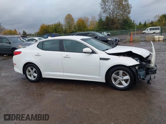 ✅ 2015 Kia Optima LX • VIN: KNAGM4A71F5575691 • Лот: 43584833. Опубликован ранее на IAAI с пробегом 160 809 миль. Бесплатный доступ к архиву аукционных продаж из США и подробный отчёт об истории автомобиля на DreamBid. Изображение 13.