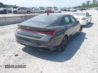 ✅ 2021 Hyundai Elantra SEL • VIN: 5NPLM4AG2MH002104 • Lot: 42785596. Listed on IAAI with 57,196 mi. Free auction sales archive from the USA and detailed vehicle history report at DreamBid. Image 4.