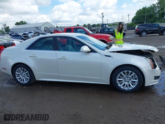 ✅ 2012 Cadillac CTS Luxury • VIN: 1G6DG5E57C0137409 • Lot: 42633890. Wystawiony na IAAI z przebiegiem 86 886 mil. Bezpłatny archiwum sprzedaży aukcyjnych z USA i szczegółowy raport historii pojazdu na DreamBid. Zdjęcie 13.