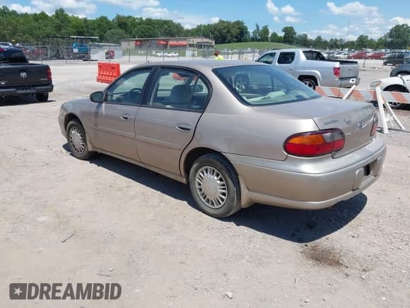2000 Chevrolet Malibu z VIN 1G1ND52J2Y6173341, wystawiony jako IAAI lot #42760201 z przebiegiem 173 679 mil mil oraz . Historia ofert i sprzedaży dostępna na DreamBid. Obrazek 3.
