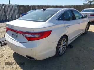 2013 Hyundai Azera z VIN KMHFH4JG9DA330074, wystawiony jako IAAI lot #41975579 z przebiegiem Nie podano mil oraz . Historia ofert i sprzedaży dostępna na DreamBid. Obrazek 4.