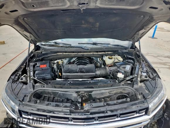 ✅ 2021 Chevrolet Suburban LT • VIN: 1GNSCCKD4MR174227 • Lot: 82164525. Listed on Copart with 99,717 mi. Free auction sales archive from the USA and detailed vehicle history report at DreamBid. Image 12.