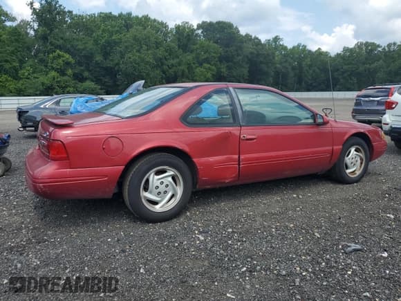 ✅ 1997 Ford Thunderbird LX • VIN: 1FALP62W4VH122159 • Lot: 65991795. Listed on Copart with 115,091 mi. Free auction sales archive from the USA and detailed vehicle history report at DreamBid. Image 3.