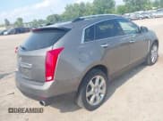 ✅ 2011 Cadillac SRX Performance Collection • VIN: 3GYFNEEY7BS649274 • Lot: 42991397. Wystawiony na IAAI z przebiegiem 142 317 mil. Bezpłatny archiwum sprzedaży aukcyjnych z USA i szczegółowy raport historii pojazdu na DreamBid. Zdjęcie 4.