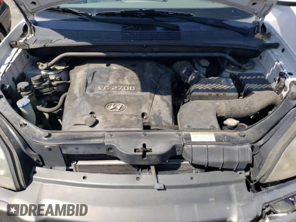 2007 Hyundai Tucson SE z VIN KM8JN72D27U590327, wystawiony jako Copart lot #51072574 z przebiegiem 90 511 mil mil oraz Szkoda całkowita • Salvage title. Historia ofert i sprzedaży dostępna na DreamBid. Obrazek 11.