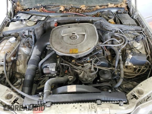 ✅ 1987 Mercedes-Benz 420 SEL • VIN: WDBCA35D1HA355822 • Лот: 58914555. Опубликован ранее на Copart с пробегом 213 832 миль. Бесплатный доступ к архиву аукционных продаж из США и подробный отчёт об истории автомобиля на DreamBid. Изображение 11.