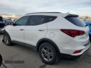 ✅ 2018 Hyundai Santa Fe 2.4L • VIN: 5XYZUDLB4JG536574 • Лот: 39175984. Опубликован ранее на Copart с пробегом 81 830 миль. Бесплатный доступ к архиву аукционных продаж из США и подробный отчёт об истории автомобиля на DreamBid. Изображение 2.