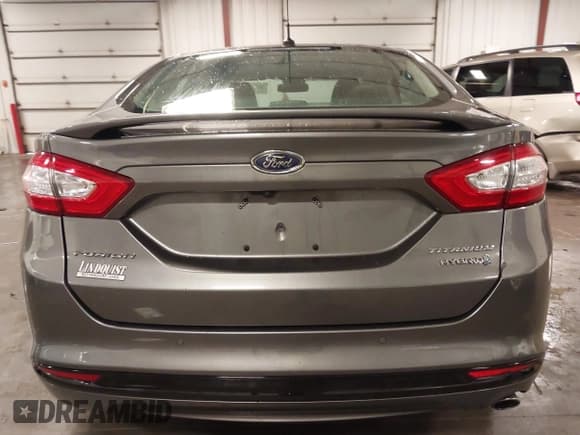 ✅ 2014 Ford Fusion Titanium Hybrid • VIN: 3FA6P0RU1ER217906 • Lot: 42563246. Listed on IAAI with 66,335 mi. Free auction sales archive from the USA and detailed vehicle history report at DreamBid. Image 17.
