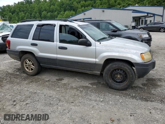 ✅ 2004 Jeep Grand Cherokee Laredo • VIN: 1J4GW48S34C184715 • Лот: 57272955. Опубликован ранее на Copart с пробегом 245 902 миль. Бесплатный доступ к архиву аукционных продаж из США и подробный отчёт об истории автомобиля на DreamBid. Изображение 4.