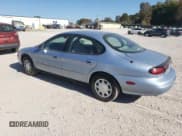 ✅ 1998 Ford Taurus LX • VIN: 1FAFP52U5WA273382 • Лот: 77102854. Опубликован ранее на Copart с пробегом 73 014 миль. Бесплатный доступ к архиву аукционных продаж из США и подробный отчёт об истории автомобиля на DreamBid. Изображение 2.