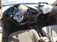 ✅ 1995 Ford Escort LX • VIN: 1FASP15J8SW308311 • Лот: 77624004. Опубликован ранее на Copart с пробегом 345 777 миль. Бесплатный доступ к архиву аукционных продаж из США и подробный отчёт об истории автомобиля на DreamBid. Изображение 8.