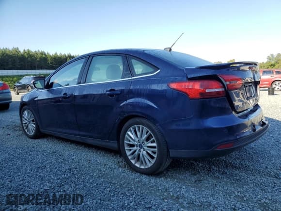 ✅ 2016 Ford Focus Titanium • VIN: 1FADP3J27GL357558 • Lot: 71401025. Listed on Copart with 197,483 mi. Free auction sales archive from the USA and detailed vehicle history report at DreamBid. Image 2.