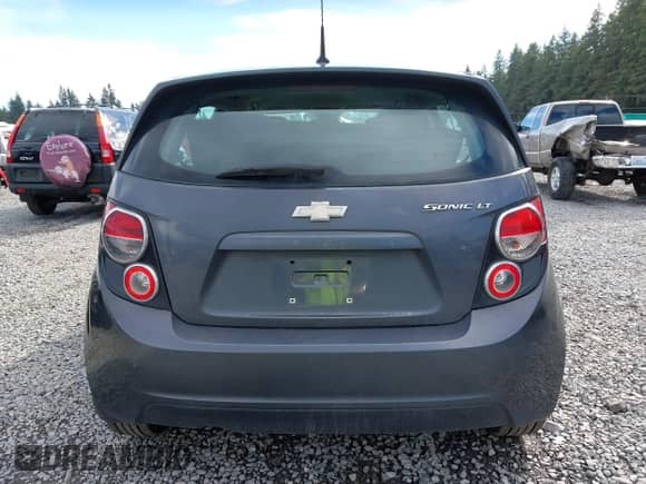 2013 Chevrolet Sonic LT with VIN 1G1JC6SG2D4148084, listed as a IAAI auction lot 43459236 with 94,963 mi miles and . Bid and sale history available at DreamBid. Image 16.
