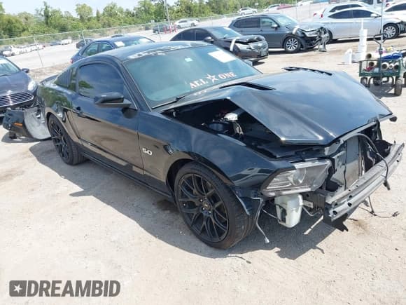 ✅ 2014 Ford Mustang GT • VIN: 1ZVBP8CF6E5282977 • Lot: 42096045. Listed on IAAI with 100,477 mi. Free auction sales archive from the USA and detailed vehicle history report at DreamBid. Image 1.