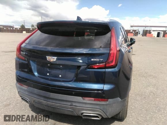 ✅ 2021 Cadillac XT4 FWD Premium Luxury • VIN: 1GYFZCR48MF004009 • Лот: 41956723. Опубликован ранее на IAAI с пробегом 82 483 миль. Бесплатный доступ к архиву аукционных продаж из США и подробный отчёт об истории автомобиля на DreamBid. Изображение 16.