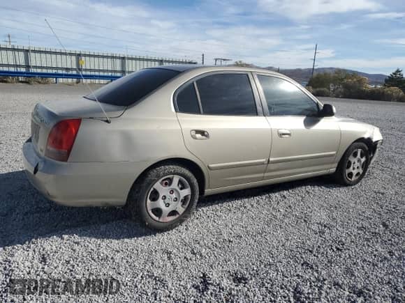 2002 Hyundai Elantra GLS z VIN KMHDN45D22U371819, wystawiony jako Copart lot #77000954 z przebiegiem 177 202 mil mil oraz Szkoda całkowita • Salvage title. Historia ofert i sprzedaży dostępna na DreamBid. Obrazek 3.