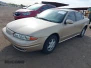 ✅ 2002 Oldsmobile Alero GL1 • VIN: 1G3NL52E52C132580 • Lot: 41933636. Wystawiony na IAAI z przebiegiem 164 863 mil. Bezpłatny archiwum sprzedaży aukcyjnych z USA i szczegółowy raport historii pojazdu na DreamBid. Zdjęcie 2.