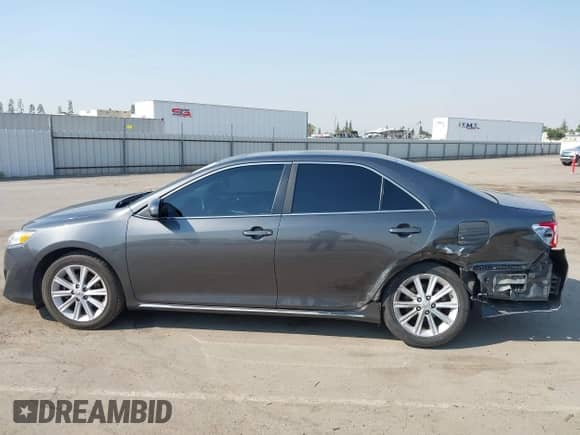 2013 Toyota Camry L with VIN 4T4BF1FK7DR297029, listed as a IAAI auction lot 43121416 with 200,854 mi miles and . Bid and sale history available at DreamBid. Image 14.