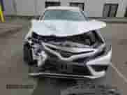 2021 Toyota Camry Hybrid XSE with VIN 4T1K31AK6MU561819, listed as a Copart auction lot 82128815 with 82,712 mi miles and Salvage title. Bid and sale history available at DreamBid. Image 5.