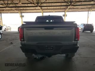 ✅ 2023 Chevrolet Colorado 4WD ZR2 • VIN: 1GCPTFEK1P1212882 • Лот: 71502184. Опубликован ранее на Copart с пробегом 12 342 миль. Бесплатный доступ к архиву аукционных продаж из США и подробный отчёт об истории автомобиля на DreamBid. Изображение 6.