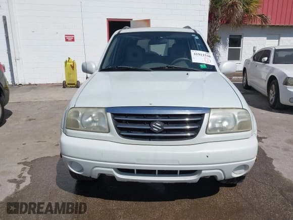 ✅ 2003 Suzuki XL7 Touring • VIN: JS3TX92V934104149 • Lot: 41911536. Wystawiony na IAAI z przebiegiem 140 199 mil. Bezpłatny archiwum sprzedaży aukcyjnych z USA i szczegółowy raport historii pojazdu na DreamBid. Zdjęcie 6.