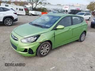 2013 Hyundai Accent GS with VIN KMHCT5AE7DU071895, listed as a IAAI auction lot 43610783 with 130,206 mi miles and . Bid and sale history available at DreamBid. Image 2.