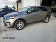 ✅ 2019 Kia Sorento LX • VIN: 5XYPG4A35KG471200 • Лот: 90474615. Опубликован ранее на Copart с пробегом 122 849 миль. Бесплатный доступ к архиву аукционных продаж из США и подробный отчёт об истории автомобиля на DreamBid. Изображение 1.
