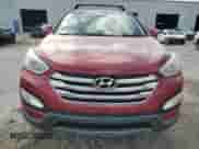 2016 Hyundai Santa Fe z VIN 5XYZWDLA3GG313145, wystawiony jako Copart lot #85717215 z przebiegiem Nie podano mil oraz Szkoda całkowita • Salvage title. Historia ofert i sprzedaży dostępna na DreamBid. Obrazek 5.
