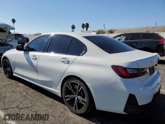 2023 BMW 3 Series M340i with VIN 3MW49FS0XP8D04859, listed as a Copart auction lot 70599935 with 26,017 mi miles and Salvage title. Bid and sale history available at DreamBid. Image 2.