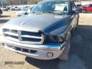✅ 2003 Dodge Dakota SLT • VIN: 1D7HL48X03S174569 • Lot: 41159169. Wystawiony na IAAI z przebiegiem 156 551 mil. Bezpłatny archiwum sprzedaży aukcyjnych z USA i szczegółowy raport historii pojazdu na DreamBid. Zdjęcie 6.