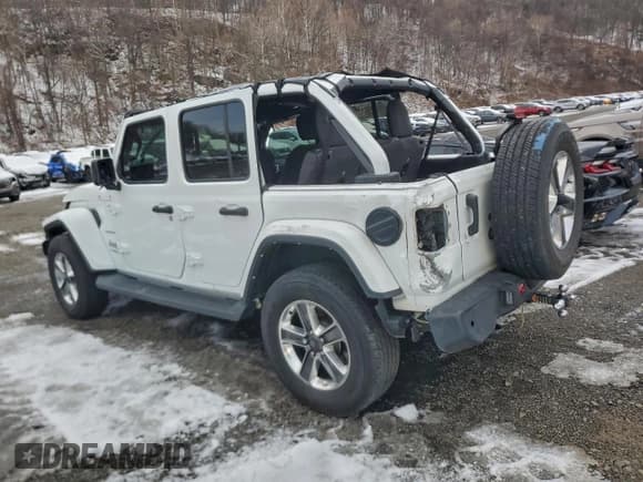 ✅ 2021 Jeep Wrangler Unlimited Sahara • VIN: 1C4HJXEG4MW505248 • Lot: 95670185. Wystawiony na Copart z przebiegiem 65 691 mil. Bezpłatny archiwum sprzedaży aukcyjnych z USA i szczegółowy raport historii pojazdu na DreamBid. Zdjęcie 2.
