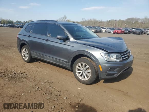 ✅ 2020 Volkswagen Tiguan S • VIN: 3VV1B7AX7LM055521 • Lot: 54419535. Listed on Copart with 69,584 mi. Free auction sales archive from the USA and detailed vehicle history report at DreamBid. Image 4.
