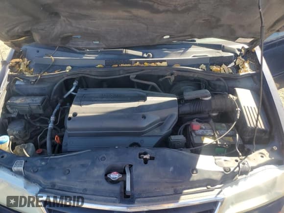 ✅ 2004 Honda Odyssey EX • VIN: 5FNRL18604B060185 • Lot: 87412525. Listed on Copart with 166,824 mi. Free auction sales archive from the USA and detailed vehicle history report at DreamBid. Image 12.