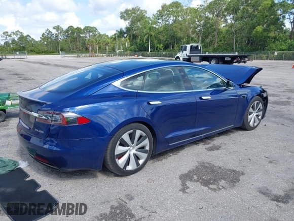 ✅ 2021 Tesla Model S Performance • VIN: 5YJSA1E43MF424593 • Lot: 42198084. Listed on IAAI with 74,546 mi. Free auction sales archive from the USA and detailed vehicle history report at DreamBid. Image 4.