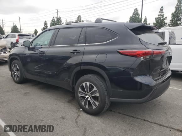 ✅ 2021 Toyota Highlander Hybrid XLE • VIN: 5TDHARAH2MS505579 • Лот: 82206795. Опубликован ранее на Copart с пробегом 131 171 миль. Бесплатный доступ к архиву аукционных продаж из США и подробный отчёт об истории автомобиля на DreamBid. Изображение 2.