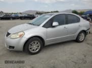 ✅ 2013 Suzuki SX4 LE • VIN: JS2YC5A35D6101897 • Лот: 62202315. Опубликован ранее на Copart с пробегом 120 532 миль. Бесплатный доступ к архиву аукционных продаж из США и подробный отчёт об истории автомобиля на DreamBid. Изображение 1.