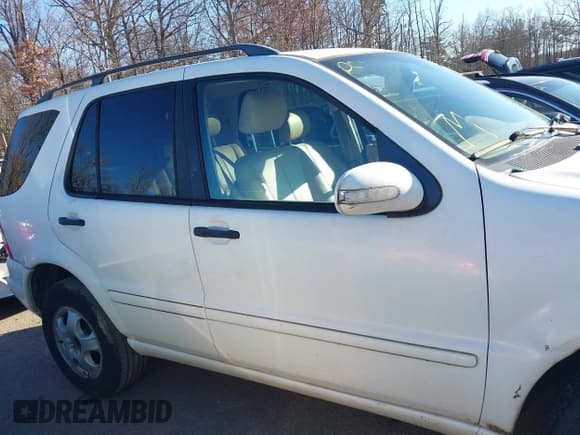 ✅ 2003 Mercedes-Benz M 320 • VIN: 4JGAB54E83A390406 • Lot: 43745134. Listed on IAAI with 196,607 mi. Free auction sales archive from the USA and detailed vehicle history report at DreamBid. Image 13.