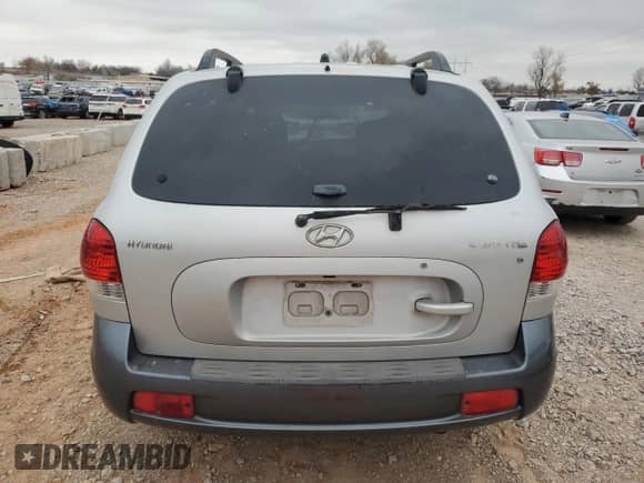 2005 Hyundai Santa Fe GLS z VIN KM8SC13D35U906966, wystawiony jako Copart lot #84896974 z przebiegiem Nie podano mil oraz Szkoda całkowita • Salvage title. Historia ofert i sprzedaży dostępna na DreamBid. Obrazek 6.