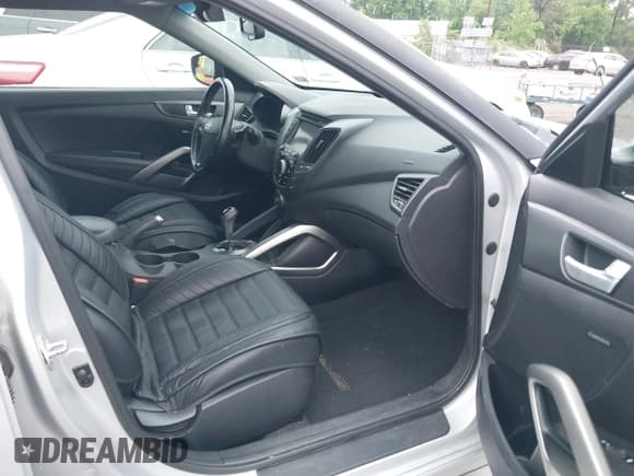 ✅ 2014 Hyundai Veloster Turbo • VIN: KMHTC6AE5EU198135 • Lot: 42236953. Wystawiony na IAAI z przebiegiem 163 139 mil. Bezpłatny archiwum sprzedaży aukcyjnych z USA i szczegółowy raport historii pojazdu na DreamBid. Zdjęcie 5.