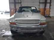 ✅ 2004 Dodge Dakota SLT • VIN: 1D7HG48N64S523528 • Lot: 41199575. Wystawiony na IAAI z przebiegiem 261 239 mil. Bezpłatny archiwum sprzedaży aukcyjnych z USA i szczegółowy raport historii pojazdu na DreamBid. Zdjęcie 12.