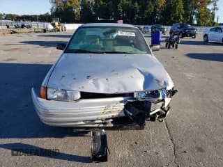 ✅ 1995 Ford Escort LX • VIN: 3FASP13J0SR159107 • Лот: 76715394. Опубликован ранее на Copart с пробегом 353 430 миль. Бесплатный доступ к архиву аукционных продаж из США и подробный отчёт об истории автомобиля на DreamBid. Изображение 5.