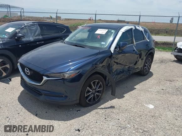 ✅ 2017 Mazda CX-5 Grand Touring • VIN: JM3KFBDL6H0224383 • Лот: 42107329. Опубликован ранее на IAAI с пробегом 132 388 миль. Бесплатный доступ к архиву аукционных продаж из США и подробный отчёт об истории автомобиля на DreamBid. Изображение 2.