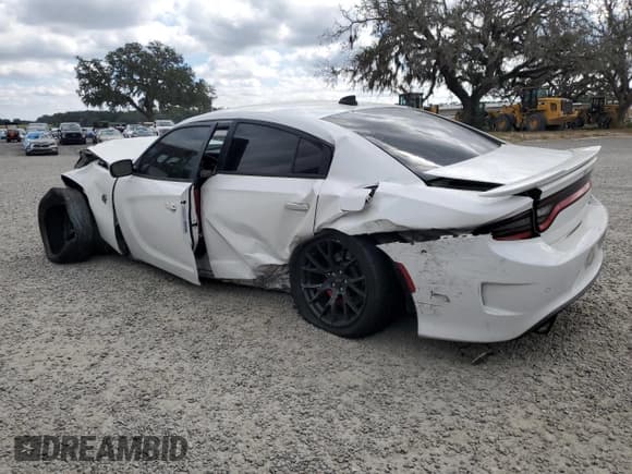 ✅ 2016 Dodge Charger SRT Hellcat • VIN: 2C3CDXL97GH214482 • Lot: 89439015. Wystawiony na Copart z przebiegiem 137 647 mil. Bezpłatny archiwum sprzedaży aukcyjnych z USA i szczegółowy raport historii pojazdu na DreamBid. Zdjęcie 2.